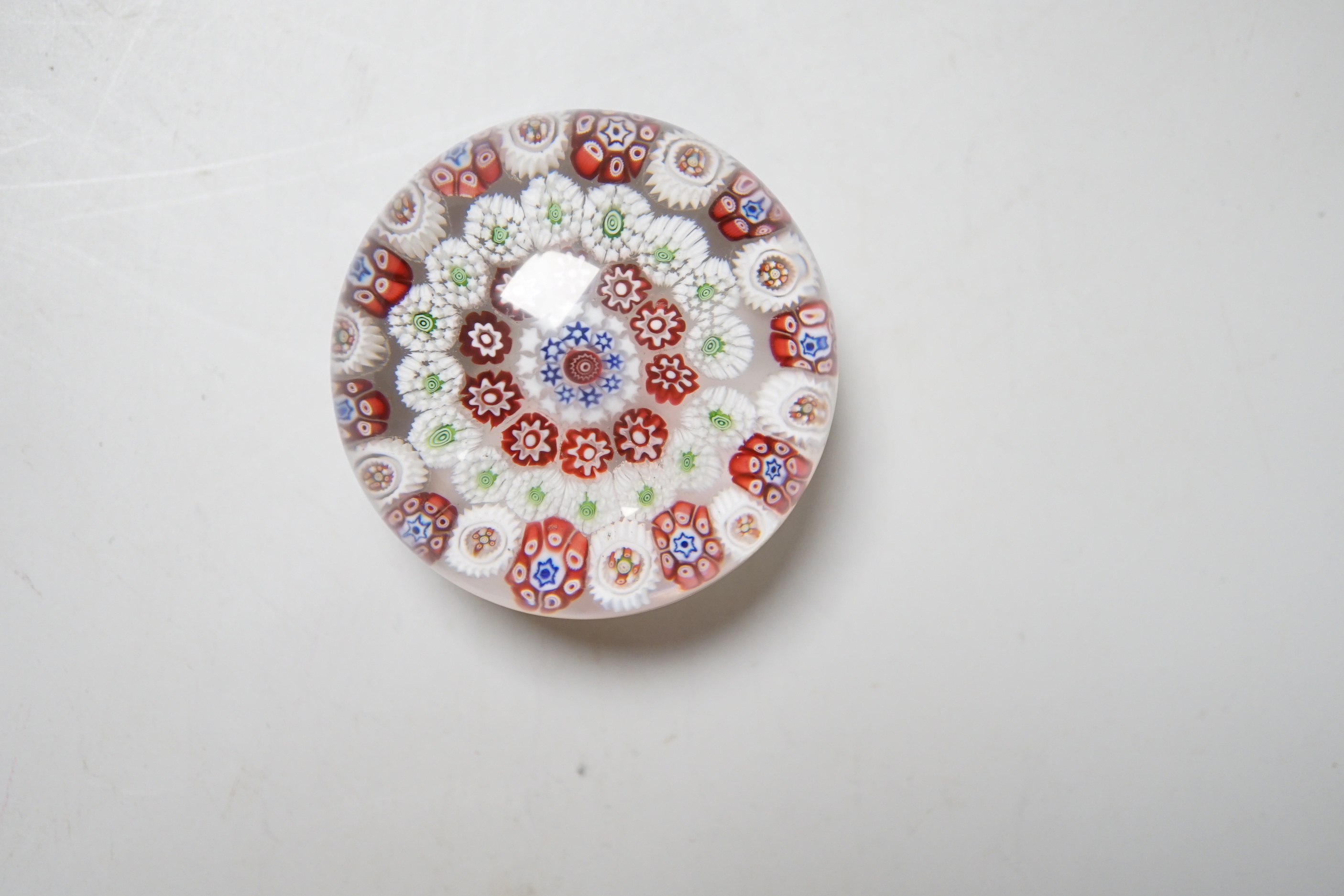 A Baccarat concentric millefleur cane paperweight, approximate diameter 4.25